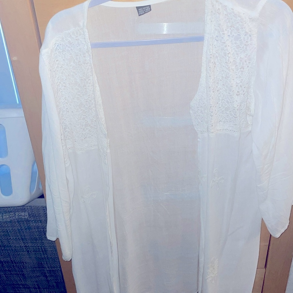 Quality cover up-duster-long shrug in white with embroidered details.